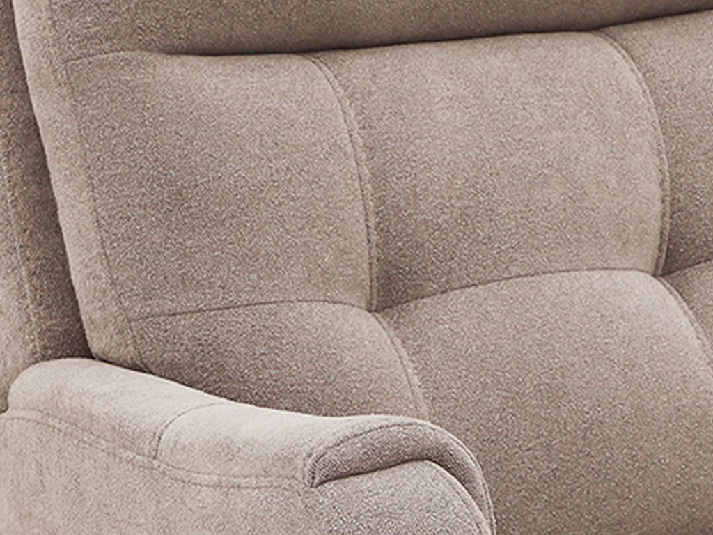 Close-up of a mocha fabric lift chair back, showing the channel stitching and the rolled arm.